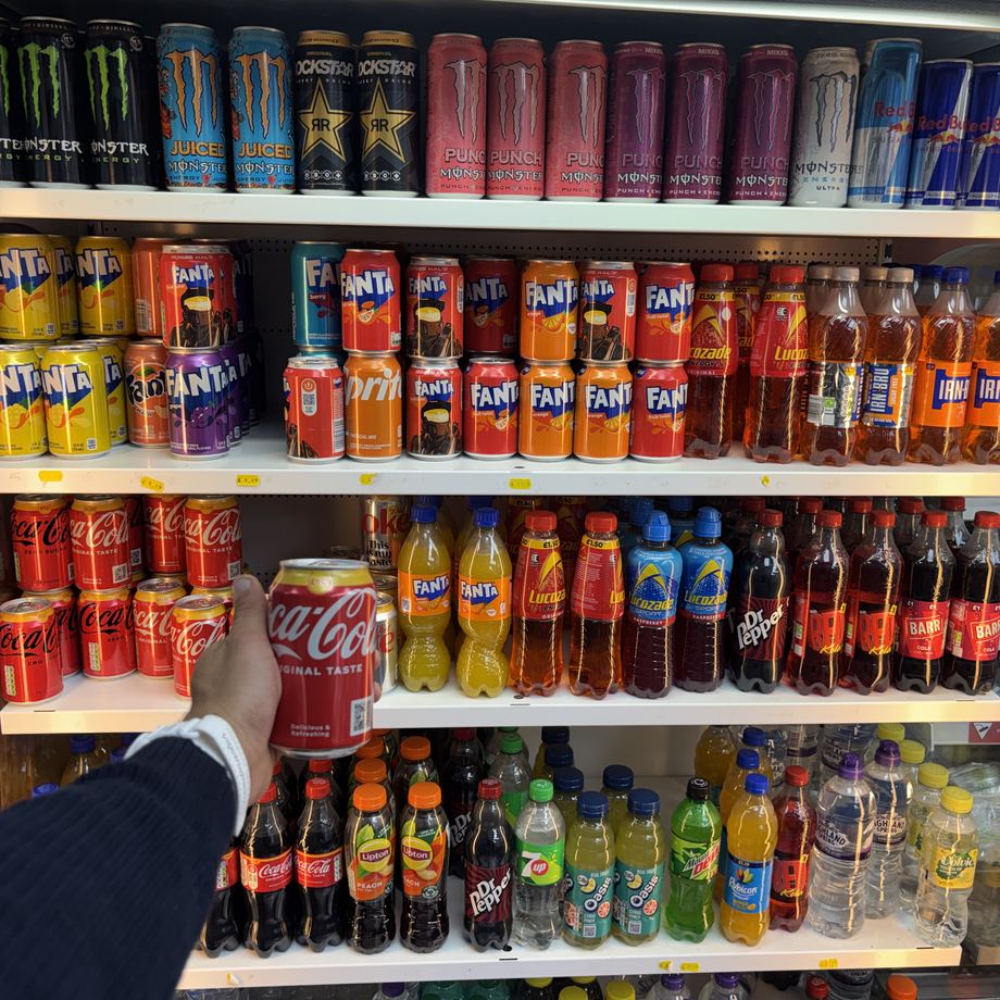 Chilled drinks fridge full of soft drinks