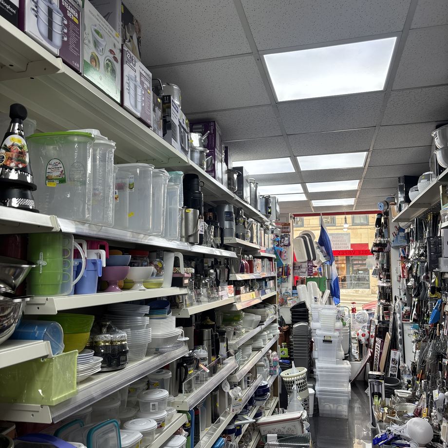 Kitchenware aisle stocked floor to ceiling